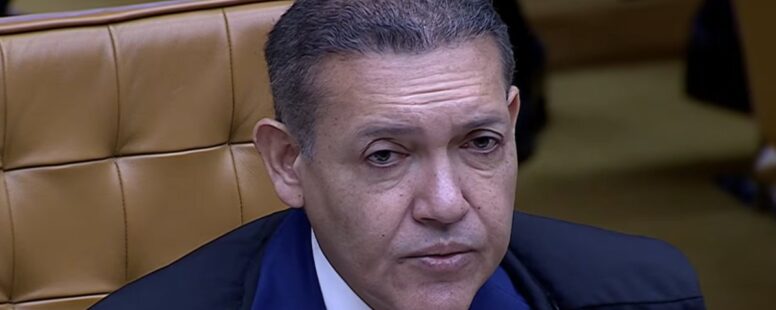 Decisões monocráticas do presidente do TSE, ministro Nunes Marques, beneficiam campanha de Flávio Bolsonaro em meio a escândalo de prostituição e corrupção